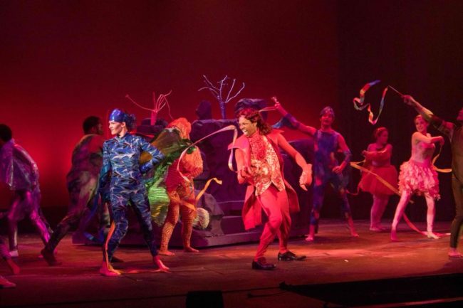 Derek Cooper (center) as Sebastian with the sea creatures during "Under Da Sea" in The Little Mermaid