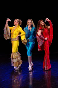 Coby Kay Callahan (left) as Tanya, Heather Marie Beck (center) as Donna Sheridan, and Tess Rohan (right) as Rosie in Mamma Mia! 