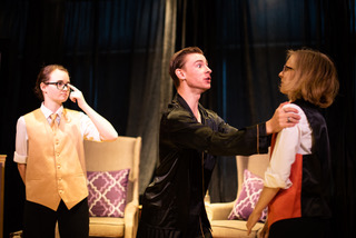 Broinninn Cummins (left) as Curio, Ian Cripe (center) as Duke Orsino, and Karis Schollenberger (righ) as Valentine