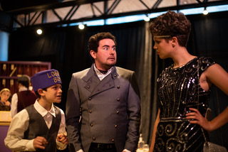 Andrew Ball (left) as Malvolio's Sidekick, Alex Foley (center) as Malvolio, and Audrey Kawecki (right) as Olivia