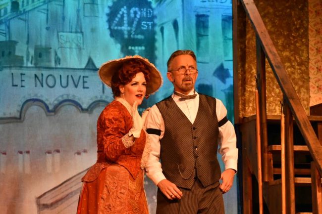 Dawn O'Croinin (left) as Dolly Levi and Homero Bayarena (right) as Horace Vandergelder in Hello, Dolly!