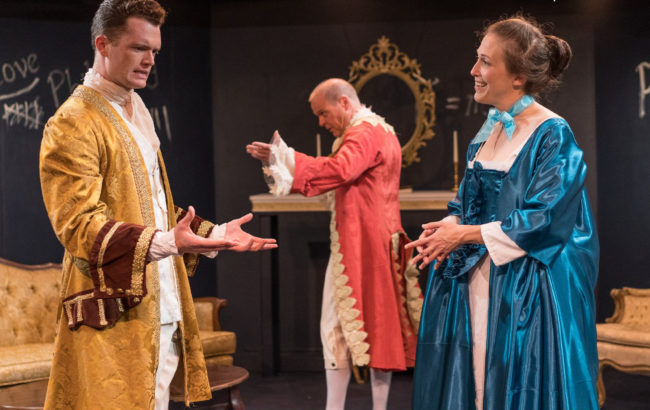 Nicholas Temple (left) as Gentleman, with Kevin Dykstra (center) as Voltaire, and Karen V. Lawrence (right) as Emilie