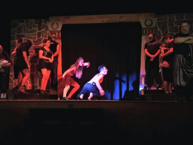 Katie Gerstmyer (center left) as Lasher and Luis "Matty" Montes (right) as Jesus of Nazareth in Jesus Christ Superstar