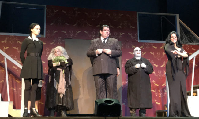 Heather Moe as Wednesday Addams, Caitlin Grant as Grandma Addams, Vincent Musgrave as Gomez Addams, Michael Crook as Uncle Fester, and Santina Maiolatesi as Morticia Addams