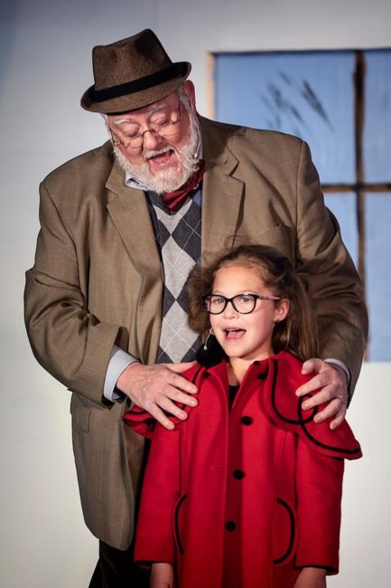 Wayne Ivusich (left) as Kris Kringle and Gracie Roberts (right) as Susan Walker