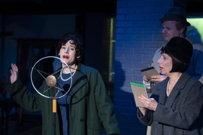 Bette Cassatt (left) as Grace Fryer, Julie Herber (right) as 'Sob Sister' Nancy Jane Harlan and J.D. Sivert (background) as Reporter Jack Youngwood in Radium Girls. Photo by Joe Williams.