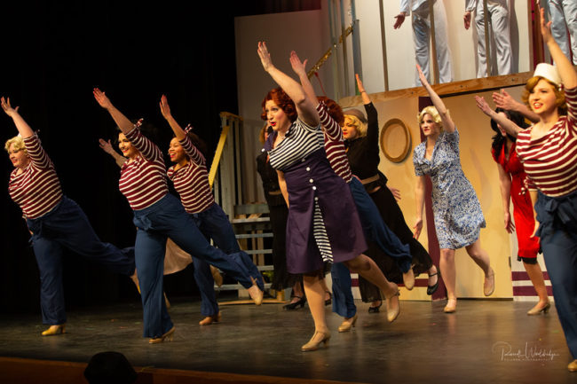 Robyn Bloom (center) as Reno Sweeney and the company of Anything Goes
