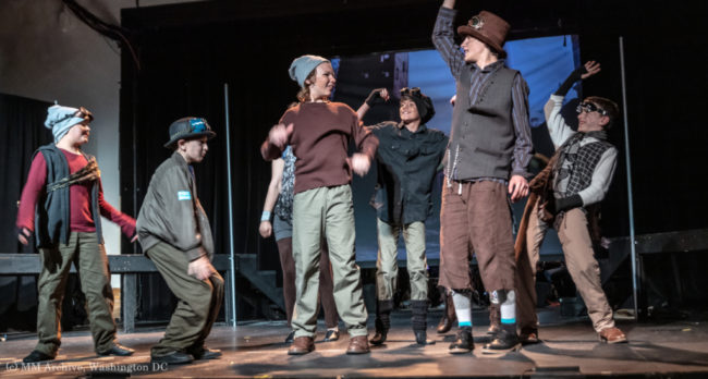 Cody Yeatman (center left) as Oliver and Cole Edelstein (center right) as the Artful Dodger in Oliver! Photo: Mark McLaughlin Photography