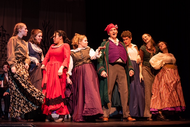 Lauren Foley (center left) as Madam Thènardier and Sean Fitch (center right) as Thènardier in Les Miserables. Photo: Alyssa Bouma