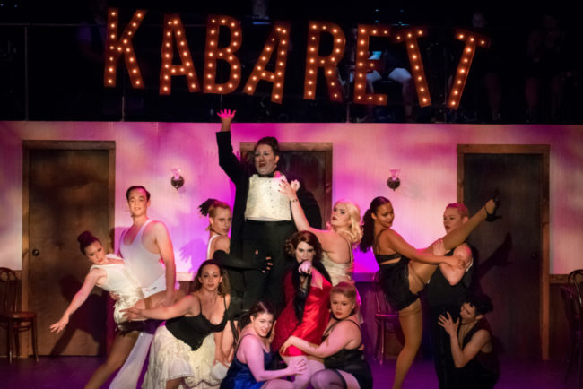 Tommy Malek (center) as the Emcee and the company of Cabaret. Photo: Stasia Steuart Photography