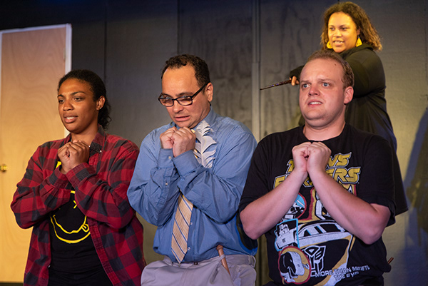 Jackie Williams (left) as Megan Jones, with Lou Otero (center) as Oliver Rivers, and Charlie W. Johnson (right) as Wayne Hopkins with Lydia West (behind) as Xavia Jones in PUFFS. Photo: Matthew Peterson