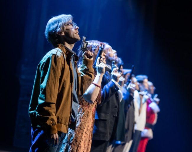 Evan Casey (as John Hinckley) and the cast of Assassins at Signature Theatre. Photo; Christopher Mueller