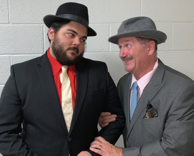 Matthew Price (left) and Good Old Reliable Nathan Detroit (Jim Morgan, right) in Guys & Dolls