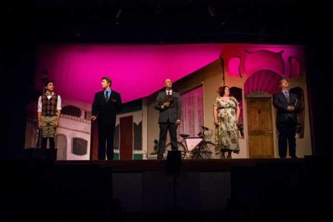 (L to R) Justin Diaz as Arpad, Kevin James Logan as Kodaly, Brad Davis as Georg Nowack, Angelica Peaco as Ilona, and Michael Tan as Sipos in She Loves Me at Silhouette Stages.