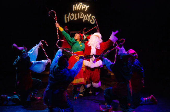 Nia Savoy (center left) as Chief Elf and Russell Sunday (center right) as Santa in A Christmas Story. Jeri Tidwell Photography