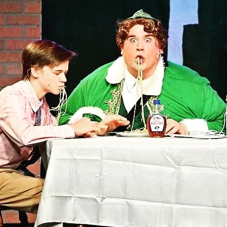 Adrien Amrhein (left) as Michael and Dickey Mahoney (right) as Buddy the Elf. 