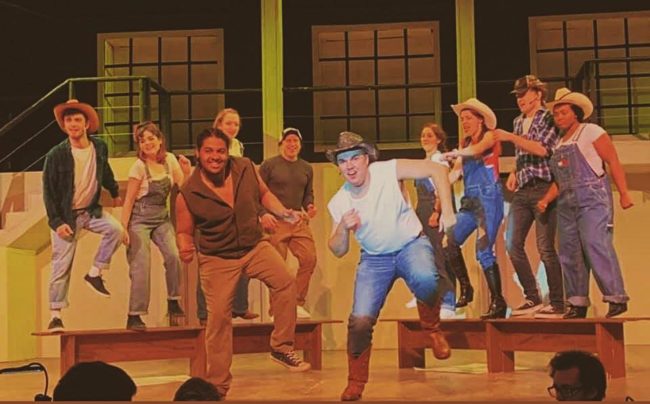 Eric Bray Jr. (center left) as Ren and Jordan Baumiller (center right) as Willard in Footloose.