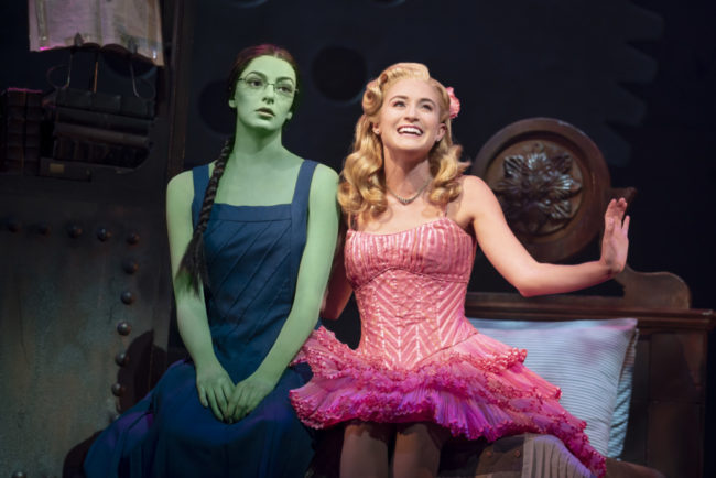 Talia Suskauer (left) as Elphaba and Allison Bailey (right) as Glinda. Photo: Joan Marcus