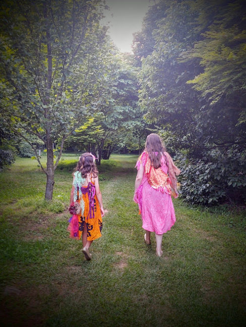 Faeries Izzy Wood (left) and Ysa Seltzer (right) guiding their audiences on a path most wondrous strange at Maryland Ensemble Theatre's 'Midsummer: A Most Rare Vision'.