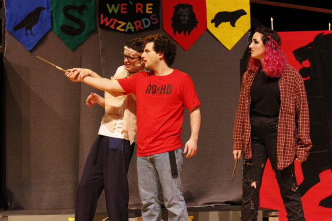 Jacob Gorham (left) as Oliver Rivers, Johnny Alderman (center) as Wayne Hopkins, and Bella Carstea (right) as Megan Jones in Puffs. Photo: Brooks Gray