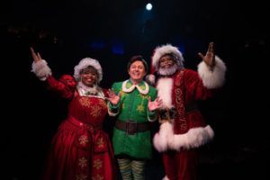 Kalen Robinson (left) as Mrs. Claus, with Jeffrey Shankle (center) as Buddy, and DeCarlo Raspberry (right) as Santa. Photo: Jeri Tidwell Photography