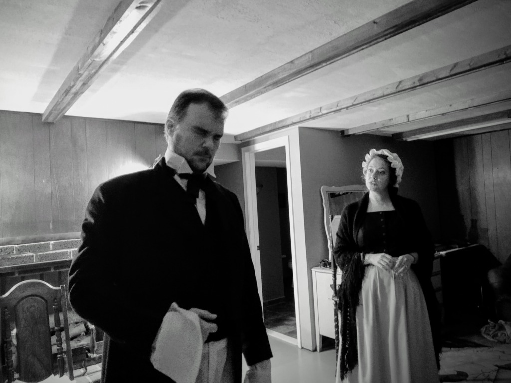 John Kelso (left) as Edgar Allan Poe and Lauren Engler (right) as The Barmaid, rehearsing for the 2021 production of Poe's Last Stanza with Do Or Die Productions.
