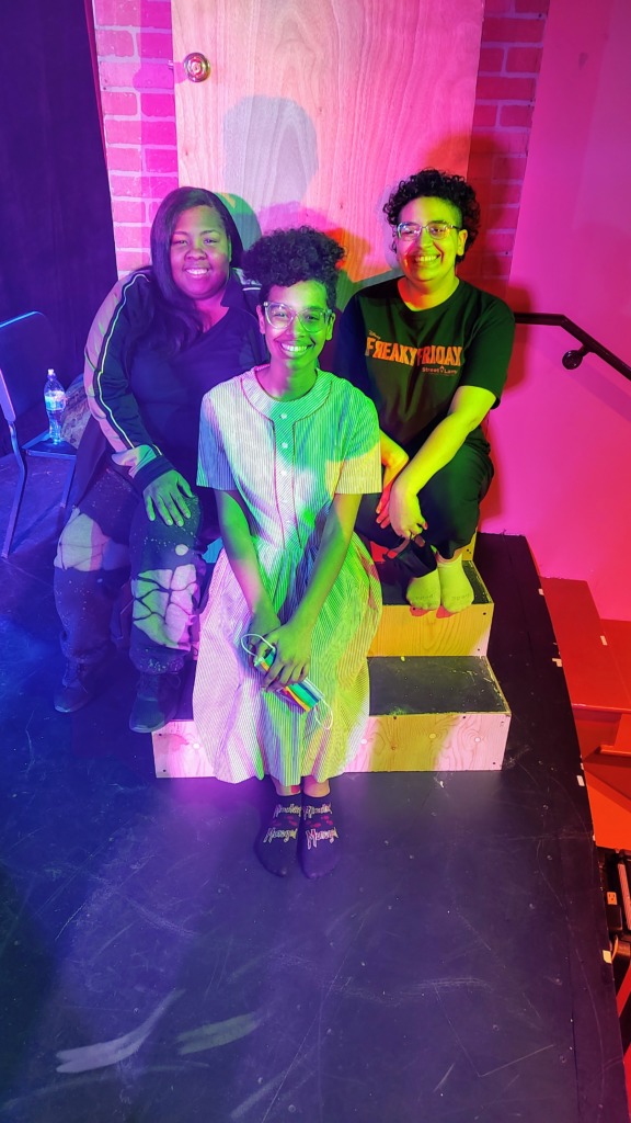 Tigga Smaller (left) with Isabel Bray (center) and Kalea Bray (right) in Little Shop of Horrors at Tidewater Players. 