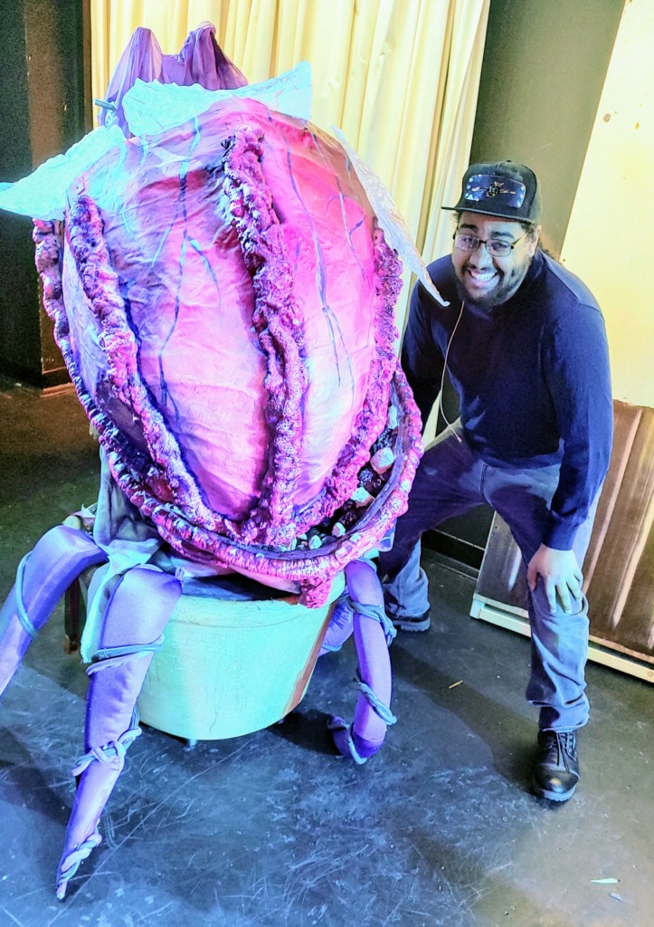 Eric Bray with Audrey II at Tidewater Players. 