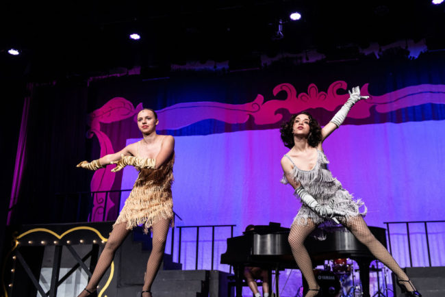 Ella Juengst (left) as Velma Kelly and Ari Mitchell (right) as Roxie Hart in Chicago: Teen Edition. 📷Scott Cech
