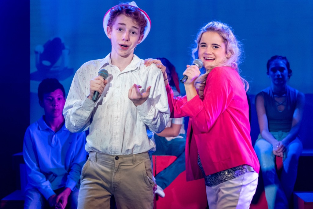 Max Ozbolt (left) as Ryan Evans and Bella Comotto (right) as Sharpay Evans in High School Musical. 📸THsquared Photography
