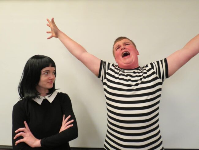 Mo Tacka (left) as Wednesday Addams and Ethan Buttman (right) as Pugsley Addams. 📷 Cathy Herlinger