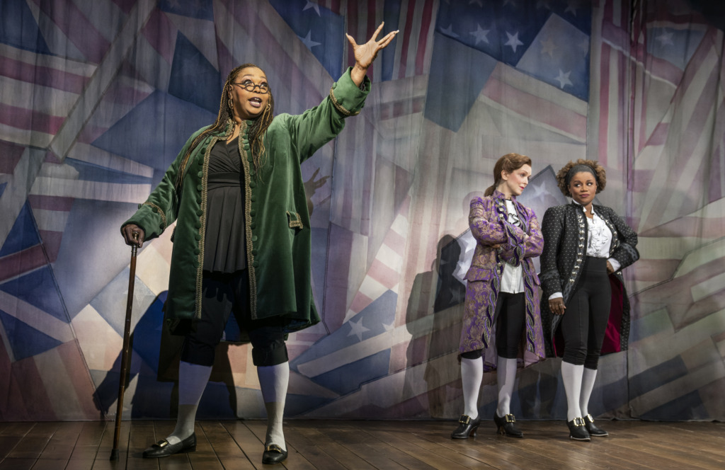 Liz Mikel (left) as Benjamin Franklin with Nancy Anderson (center) as Thomas Jefferson and Gisela Adisa (right) as John Adams in 1776. 📷 Joan Marcus