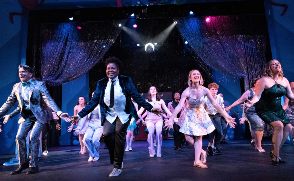 Nia Chavis (center left) as Emma and Julia L. Williams (center right) as Alyssa and the cast of The Prom at Cockpit in Court 📷Trent Haines-Hopper
