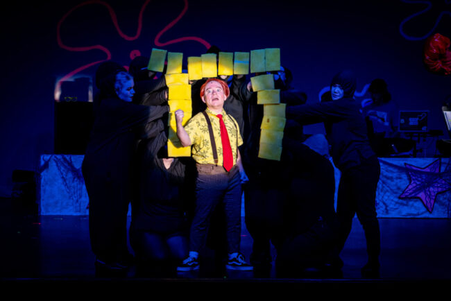 Matt Wetzel (center) as SpongeBob and the ensemble of The SpongeBob Musical at Silhouette Stages. 📷 Stasia Steuart Photography