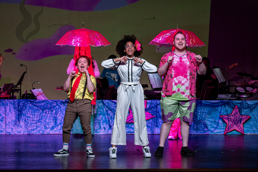 Matt Wetzel (left) as SpongeBob with Summer Moore (center) as Sandy and Geraden Ward (right) as Patrick in The SpongeBob Musical at Silhouette Stages. 📷 Stasia Steuart Photography