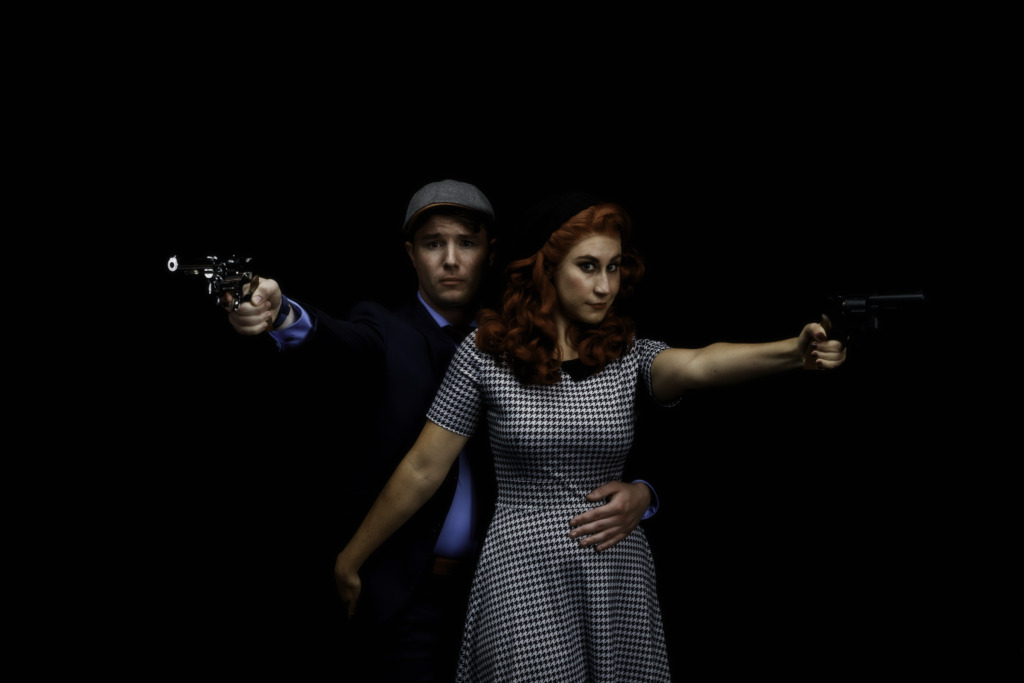 Gage Wright (left) as Clyde and Lizzie Detar (right) as Bonnie in Bonnie & Clyde at Just Off Broadway. 📸AZebrowski Photography