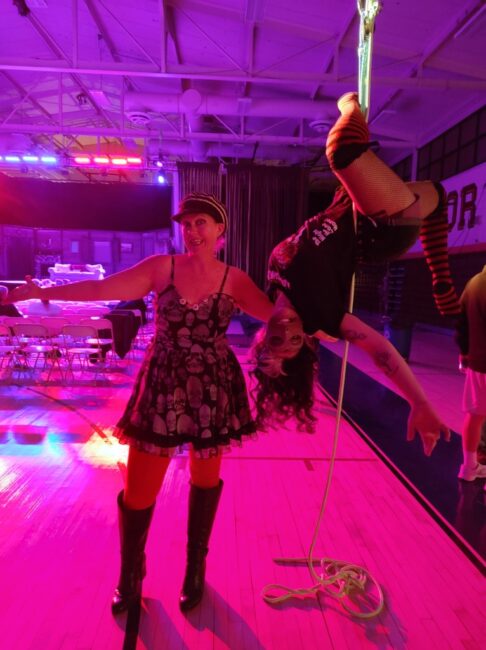 Mandy Gunther (left) with Ceiling Candy Aerial Artist London St. Juniper (upside-down) 📷 Becky Flickinger
