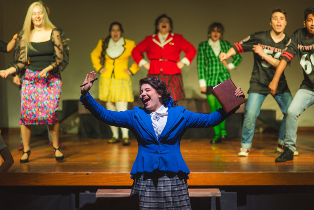 Molly McVicker (center) as Victoria Sawyer and the cast of Heathers at Third Wall Productions 📷 Matthew Peterson