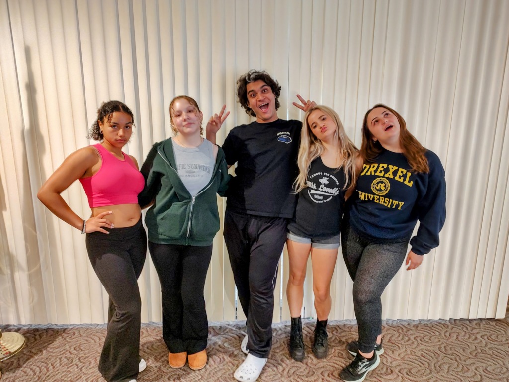 (From L to R in their 'character poses') Allyson Gray as Regina George, Lillian Colon as Gretchen Wieners, Shahmeer Mirza as Damian Hubbard, Bella Comotto as Janis Sarkisian, and Talia Lebowitz as Karen Smith in Mean Girls (high school edition) at Children's Playhouse of Maryland