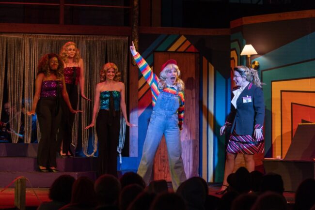 Meghan McCarthy (center) as Ben/Lisa and the cast of Disaster! at Annapolis Summer Garden Theatre 📷 Alison Harbaugh, Sugar Farm Productions