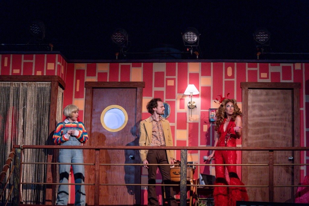 Meghan McCarthy (left) as Ben/Lisa with Cameron Walker as Ted (center) and Caitlyn Ruth McClellan (right) as Jackie in Disaster! at Annapolis Summer Garden Theatre 📷 Alison Harbaugh, Sugar Farm Productions