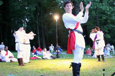 Background Left- Sean Elias as Balthazar and Christopher Ryder as Antonio. Background Right- Josh Thomas as Don Pedro. Center- Brendan Edward Kennedy as Claudio. Photo by Terence O'Hara.