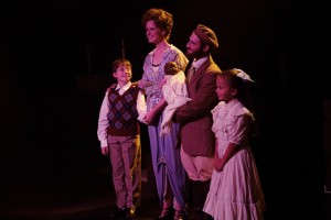 (L to R) Edgar (Gavin Willard) Mother (Elizabeth Rayca) Tateh (Josh Simon) and Little Girl (Ella Boodin) in Ragtime at Toby's Dinner Theatre