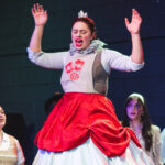 Alana Guardipee (center) as Queen of Hearts and the ensemble of Alice By Heart at Street Lamp Community Theatre 📷 Matthew Peterson