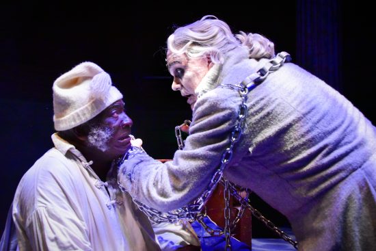Greg Burgess (left) as Ebenezer Scrooge and Lance Bankerd (right) as the Ghost of Jacob Marley in the 2019 production of A Christmas Carol at Chesapeake Shakespeare Company 📷 Brandon W. Vernon