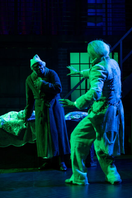 Gregory Burgess (left) as Scrooge and Steven Todd Smith (right) as Marley in Chesapeake Shakespeare Company’s A Christmas Carol 📷Kiirstn Pagan Photography.