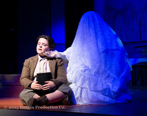 Brady Fiol (left) as Oliver and Jessica Preactor (isn't really there...right) in Oliver! 📷 Kevin Clasing