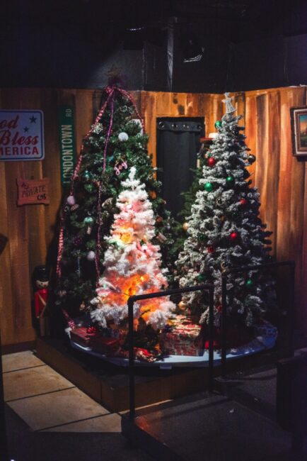 Justin Nepomuceno's Christmas Tree Turntable Spectacular in A Tuna Christmas at Spotlighters Theatre 📷 Matthew Peterson