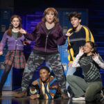 Emily Koch (center) as Debra and the cast of the National Tour of Kimberly Akimbo 📷 Joan Marcus