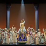 Monica Tulia Ramirez (center on horse) as Inez Milholland and the company of Suffs 📷 Joan Marcus